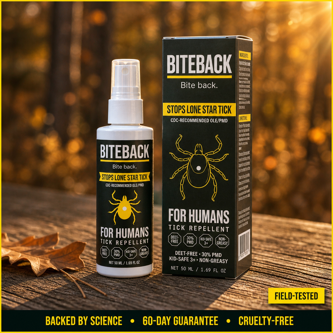 BITEBACK Human spray bottle and box on a sun-bleached cedar plank at the edge of a forest, golden hour